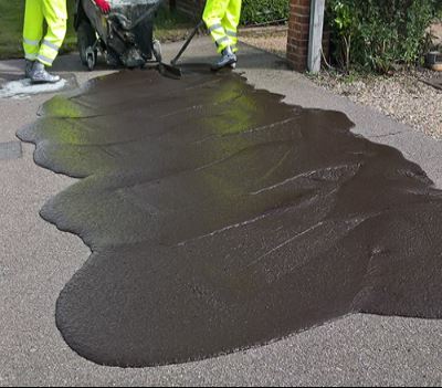 Image showing slurry sealing taking place